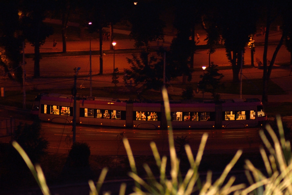 Old Trolley Car in Red Light by Night