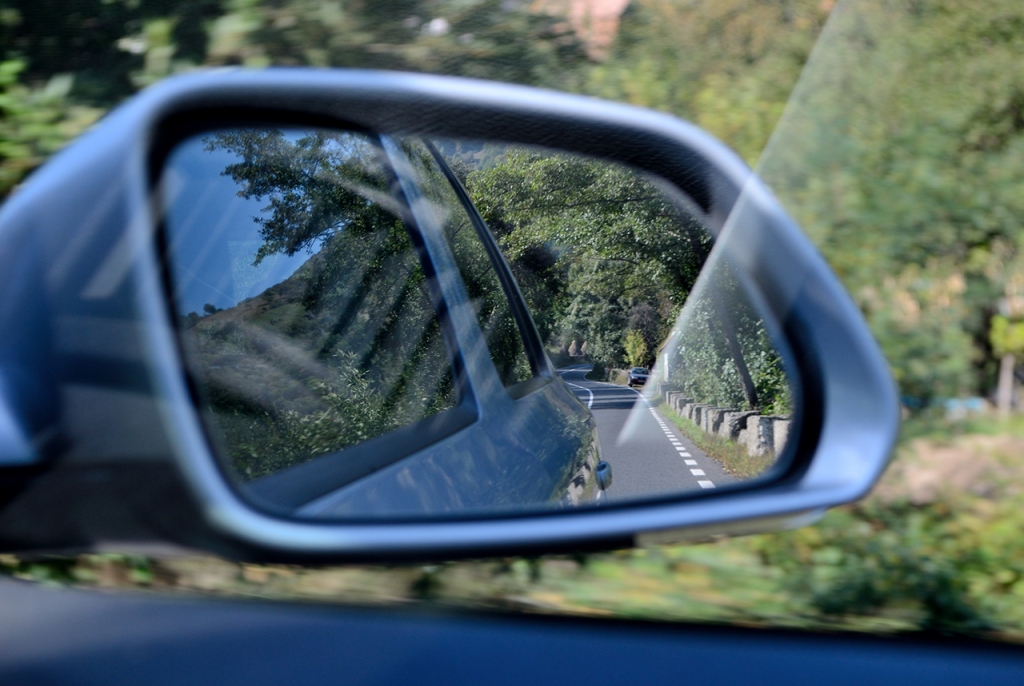 Road Reflected in Car Wing Mirror